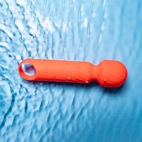 Maia Dolly Mini Massage Wand in Orange Electric Massager