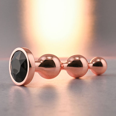 Gender X GOLD DIGGER SMALL - Small Butt Plug with Black Gem Base > Anal Range > Jewel Butt Plugs