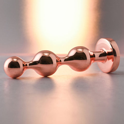 Gender X GOLD DIGGER SMALL - Small Butt Plug with Black Gem Base > Anal Range > Jewel Butt Plugs