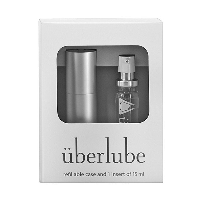 Überlube refillable case and 15 ml spray insert set in a white box with a clear window, shown on a white background.