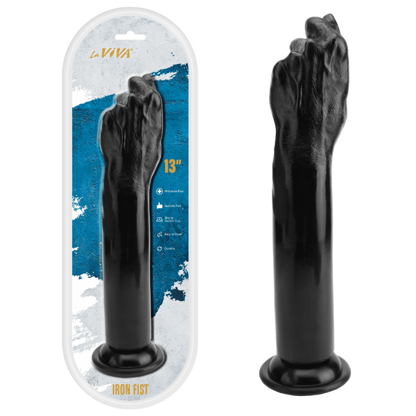 Black iron fist adult novelty product shown both inside its retail blister packaging and standing unpackaged on a plain white background. The package features a white border with blue graphic accents and gold text reading 'LIVA' and 'IRON FIST 13"'.